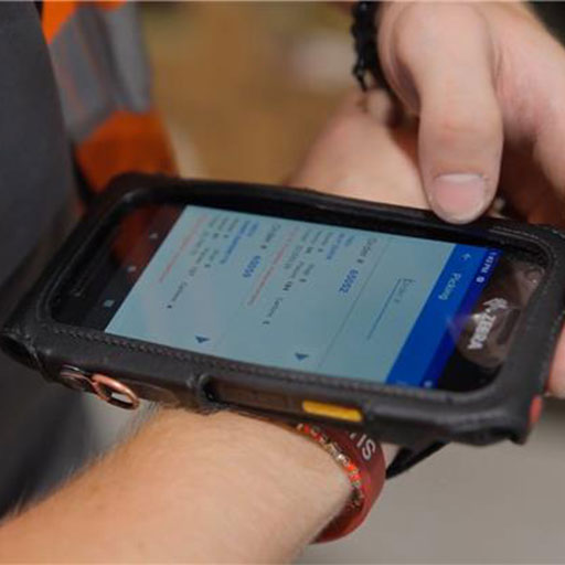 Warehouse worker with RF scanner